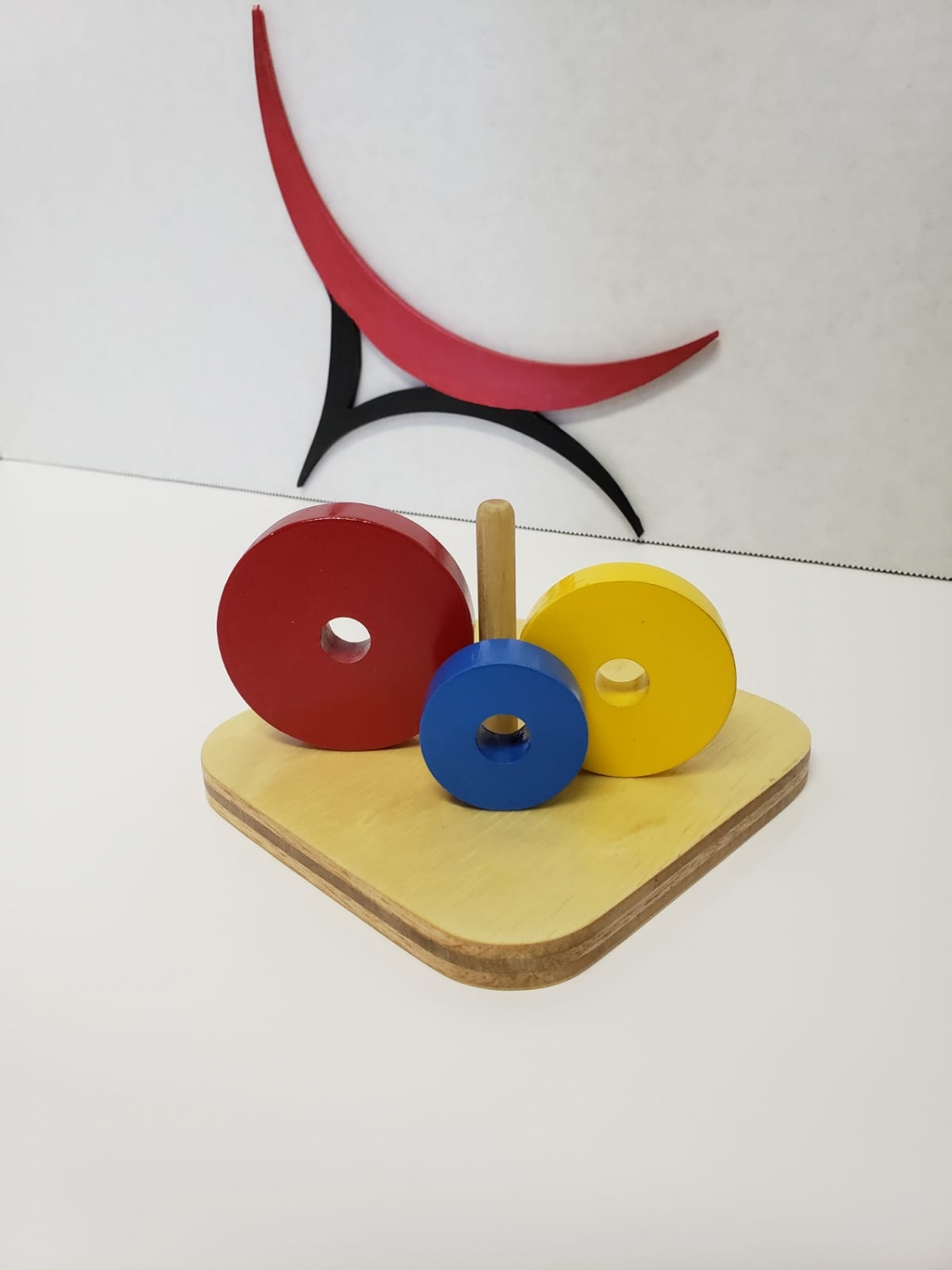 Colored Discs on Three Dowels – Pink Montessori